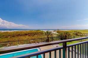 A pool with a view of the beach and ocean. - Oceanview Condo With Pool, Beach Access, Jetted Tub, W/d, & AC (Jacksonville Beach)