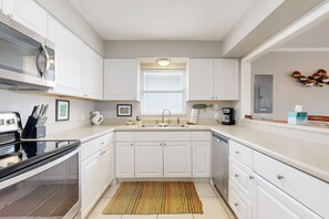 House, Multiple Beds, Patio, Garden View (Whale Tale - Main) | Private kitchen - Ocean-view Hideaway Steps to Beach Snowbird Availability (Fernandina Beach)