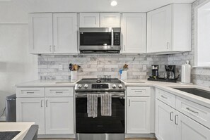 Condo, Multiple Beds, Balcony, Ocean View (Sunshine and a View) | Private kitchen - Polished Oceanfront Condo With Pool Access, Private Balcony & Washer/dryer (Jacksonville Beach)