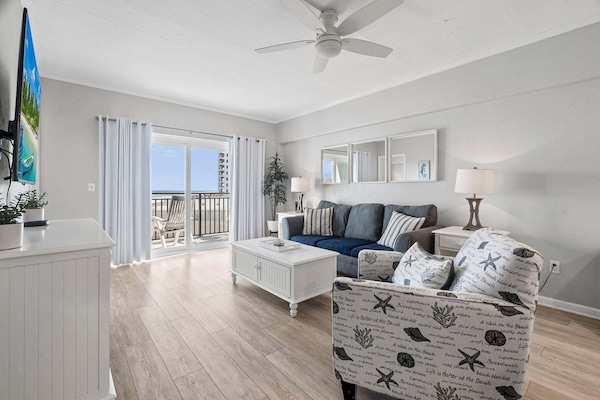 Condo, Multiple Beds, Balcony, Ocean View (Sunshine and a View) | Living area