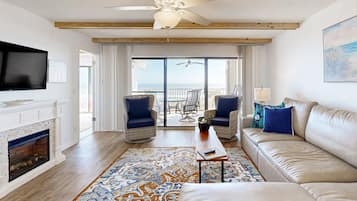 Appart'hôtel, plusieurs lits, patio, vue océan (302 Atlantis on Amelia) | Coin séjour