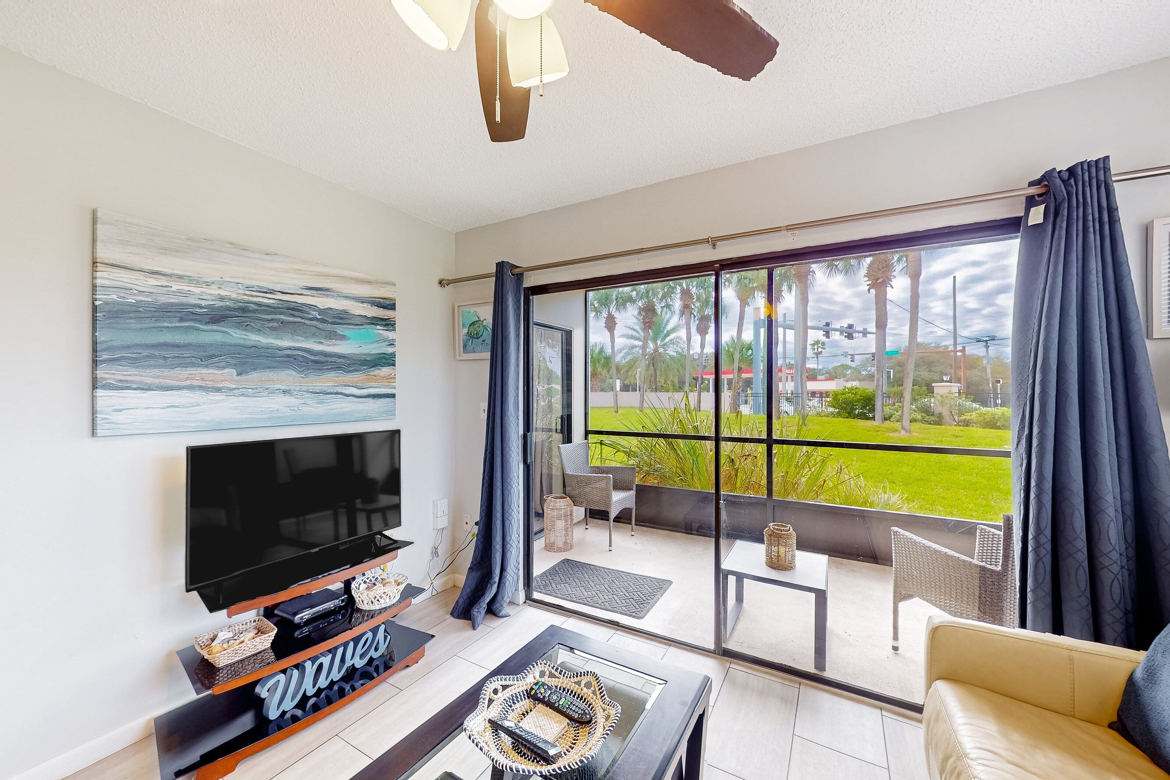 Appartement, 1 queensize bed met slaapbank, terras, uitzicht op tuin (The Shimmering Palm) | Woonruimte