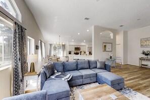 House, Multiple Beds, Pool Access, Pool View (The Barefoot Bungalow) | Living area - The Barefoot Bungalow House in Palm Coast With an Enclosed Pool & Grill (Palm Coast)