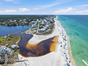 An aerial view of a coastal area with a beach, a marina, and residential buildings. - Steps to the beach! Perfect Location Seagrove area.  3BR 2 bath, 2Pool, sleeps 8 (Santa Rosa Beach)