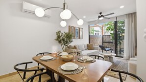 Comfort Apartment, 2 Bedrooms | Living area - Gran Tulum Residences by Casago (Tulum)