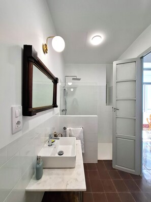 Shower, eco-friendly toiletries, hair dryer, bidet