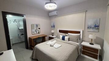 Desk, laptop workspace, blackout curtains, soundproofing