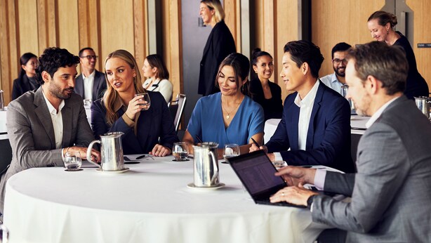 A conference room with round tables, laptops, and water pitchers. - Hyatt House Ontario Airport (Ontario)