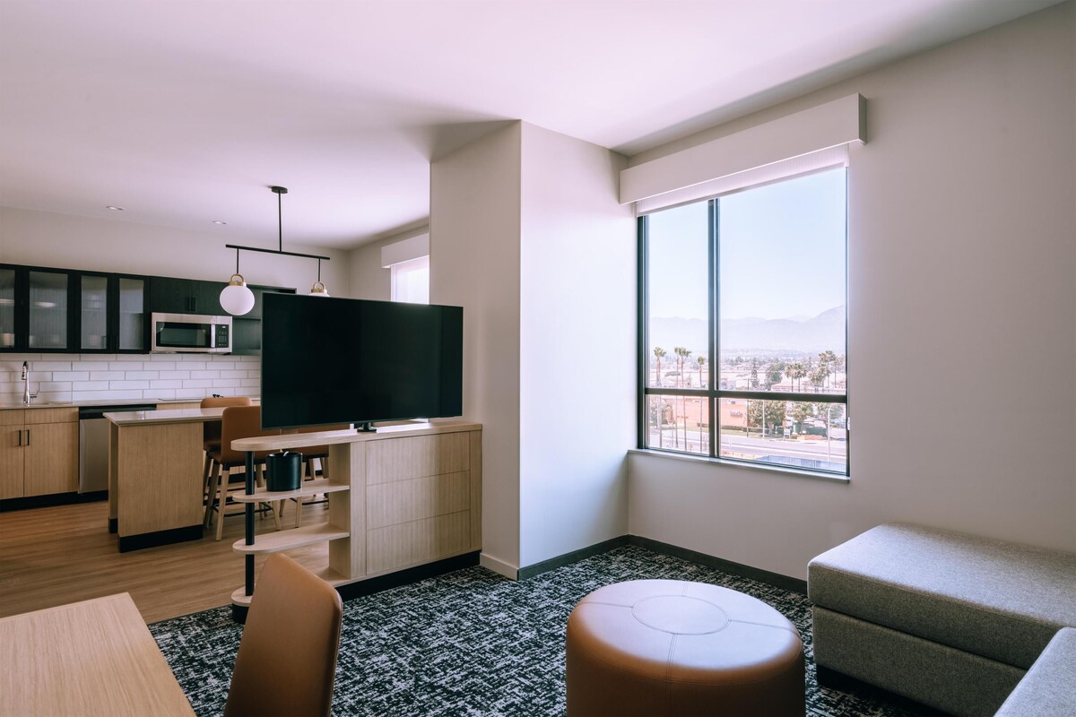 Suite, 1 Bedroom (Specialty, 1 King Bed & 1 Sofa Bed) | In-room safe, desk, laptop workspace, blackout curtains
