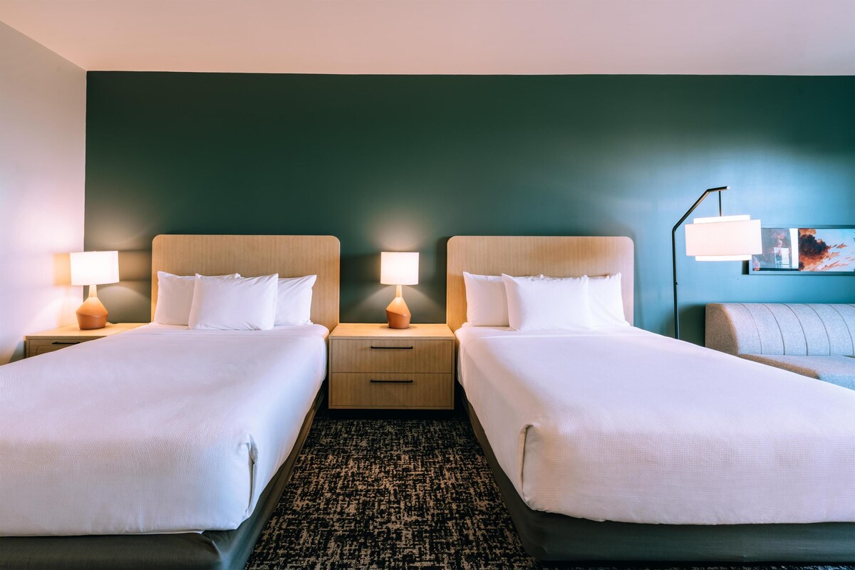 Room (Den, 2 Queen Beds & 1 Sofa Bed) | In-room safe, desk, laptop workspace, blackout curtains