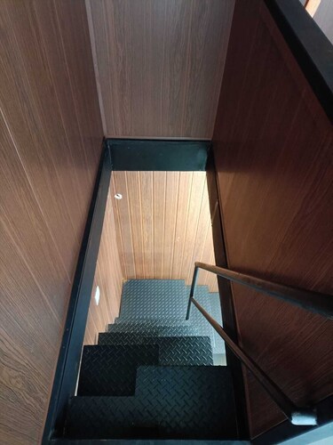 Cozy two-story container house, perfect for those seeking privacy!