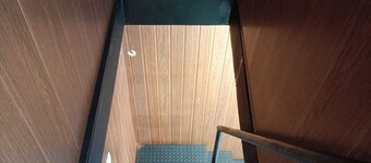 Cozy two-story container house, perfect for those seeking privacy!