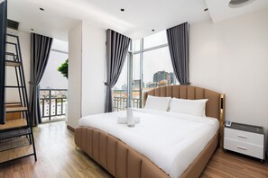 Deluxe Studio, City View | In-room safe, desk, laptop workspace, blackout curtains - Lancaster Luxury Jptown HCMC (Ho Chi Minh City)