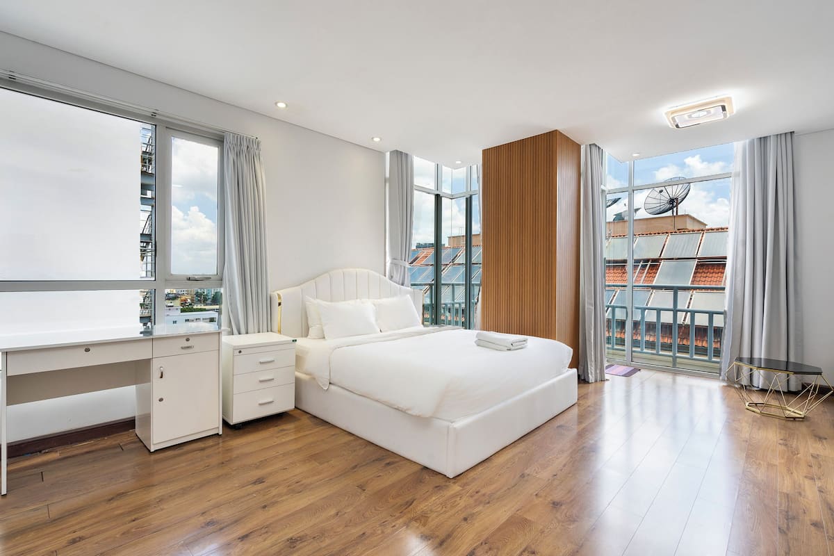 Deluxe Studio, City View | In-room safe, desk, laptop workspace, blackout curtains