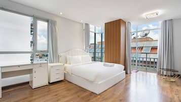 Deluxe Studio, City View | In-room safe, desk, laptop workspace, blackout curtains