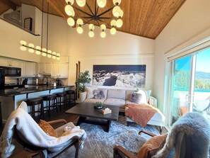 Smart TV, fireplace, table football, books