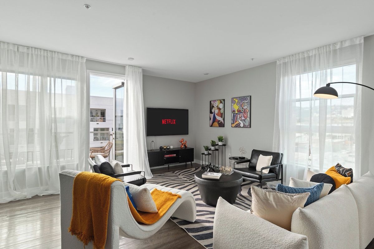 Welcome to our cozy living room, designed for ultimate relaxation and comfort. Sink into our plush sofa, surrounded by stylish decor that exudes warmth and charm. Unwind in front of the flat-screen TV, or cozy up by the fireplace on cooler evenings.
