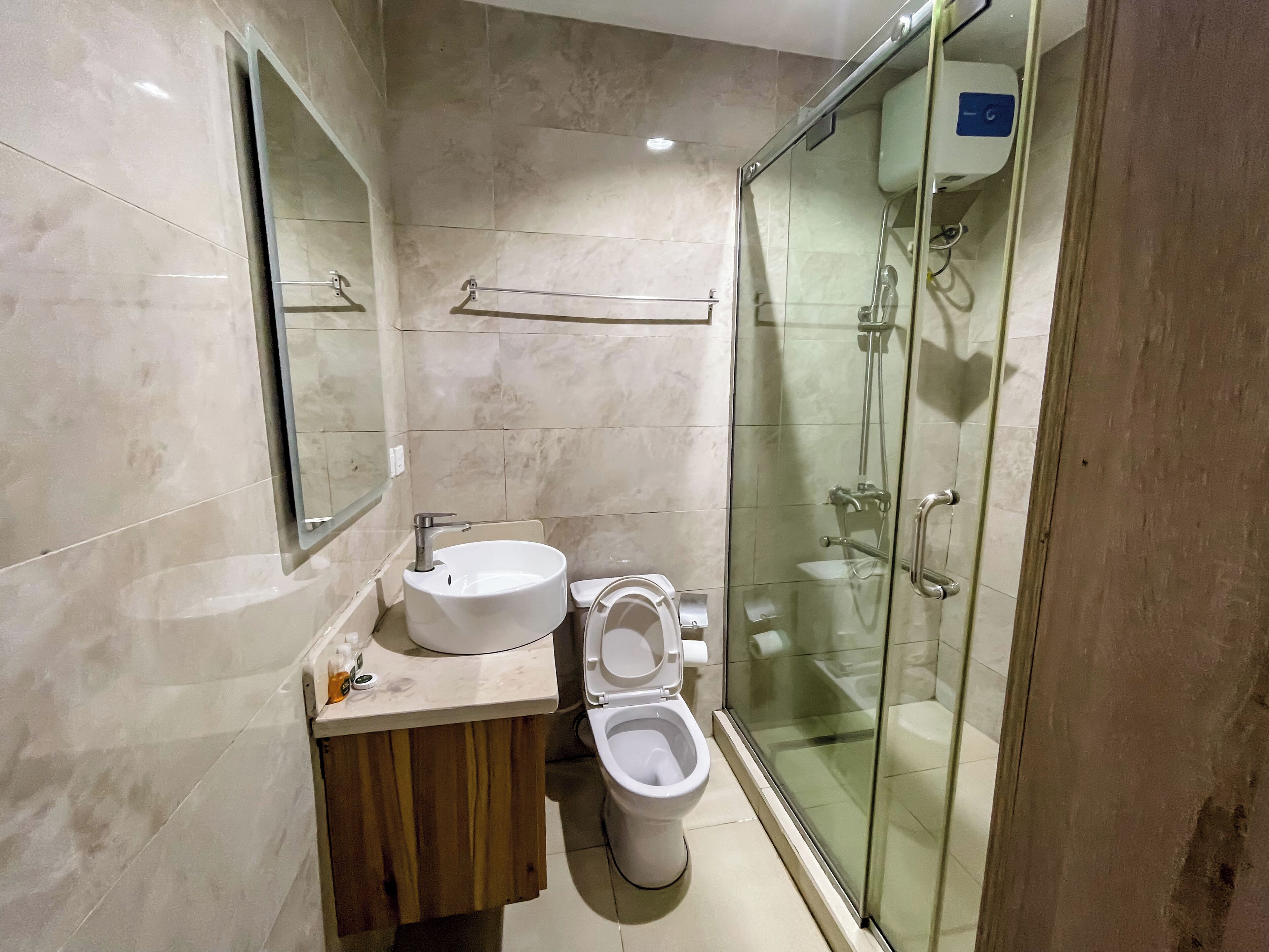 Shower, free toiletries, slippers, towels