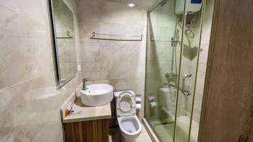 Shower, free toiletries, slippers, towels