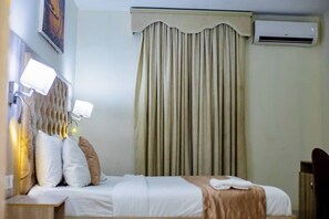 In-room safe, desk, laptop workspace, blackout drapes - OTI RESORT (Benin City)