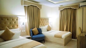 In-room safe, desk, laptop workspace, blackout drapes - OTI RESORT (Benin City)