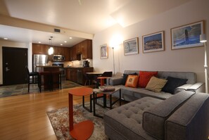 Living area - 1 bedroom, top floor, stunning views! Hot tubs, fitness & parking garage onsite. (Canmore)