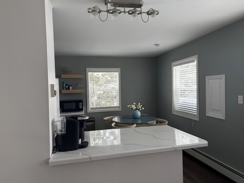 Close to trail 2-bedroom unit in South Range for your next getaway.