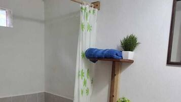 Comfort Room, Patio, Courtyard View | Bathroom | Shower, towels, soap, shampoo
