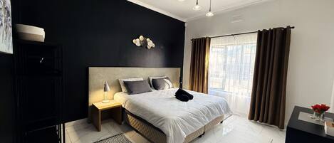 4 dormitorios, tabla de planchar con plancha, wifi y ropa de cama