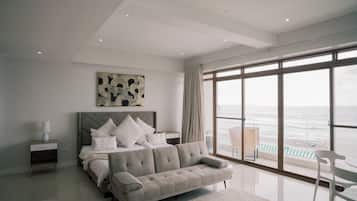 Suite, 1 King Bed, Private Bathroom, Sea View | Blackout drapes, free WiFi