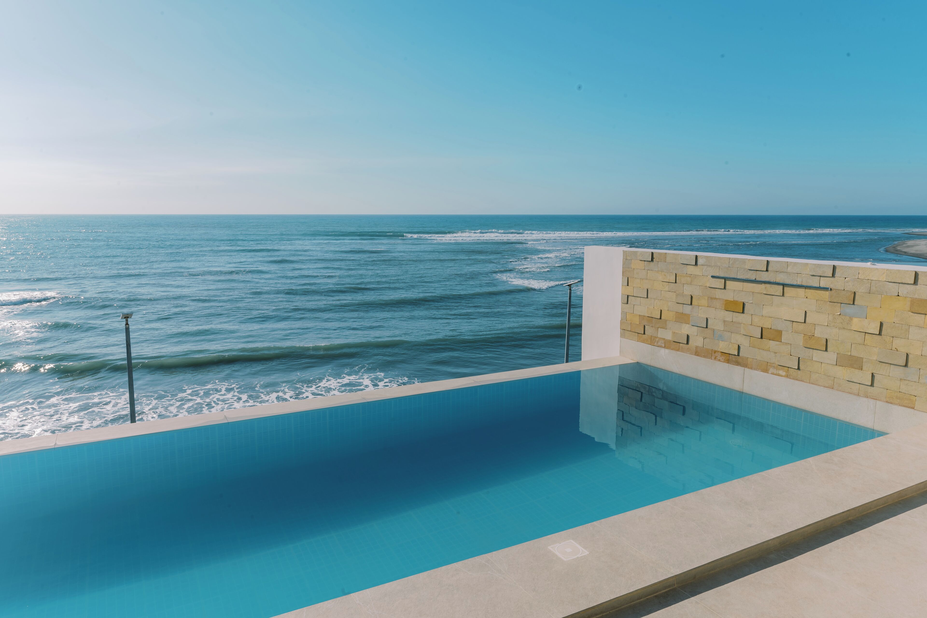 Outdoor pool, open 8:00 AM to 10:00 PM, sun loungers