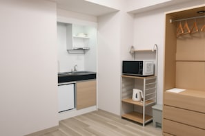 Mini-fridge, microwave, stovetop, cookware/dishes/utensils