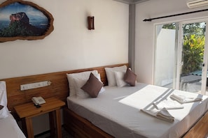 Comfort Quadruple Room, Garden View | Desk, laptop workspace, iron/ironing board, free WiFi