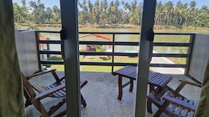Double Room Single Use, Balcony, Garden View | Property grounds