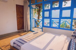 Chambre Deluxe Double ou avec lits jumeaux, vue lac | Fer et planche à repasser, Wi-Fi gratuit