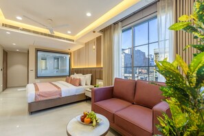 In-room safe, desk, laptop workspace, blackout curtains - The Delhi Dreams - A Luxury Hotel (New Delhi)