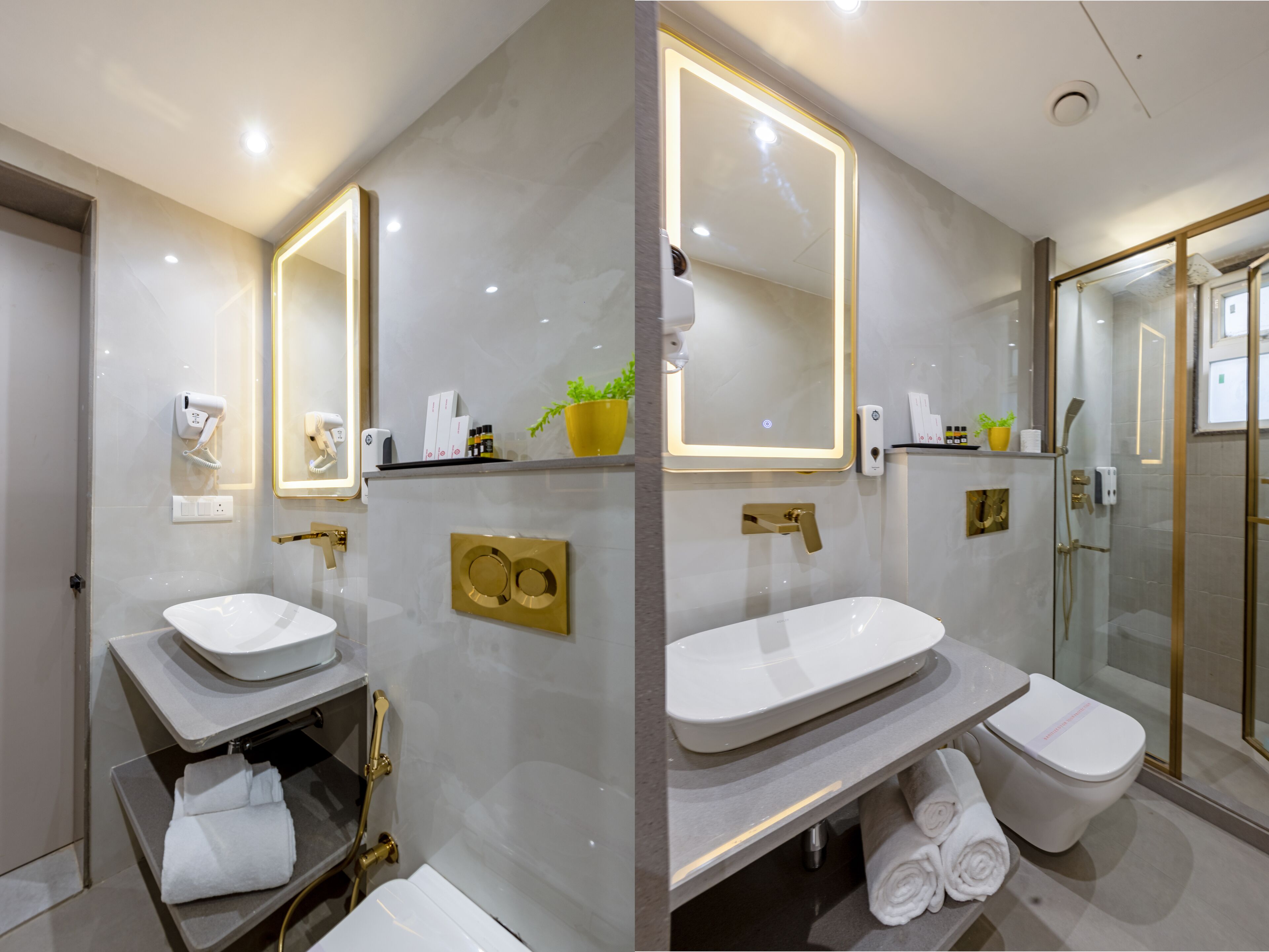 A modern bathroom with a large mirror, a sink, a toilet, and a shower area.