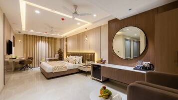 Signature Suite, City View | In-room safe, desk, laptop workspace, blackout drapes