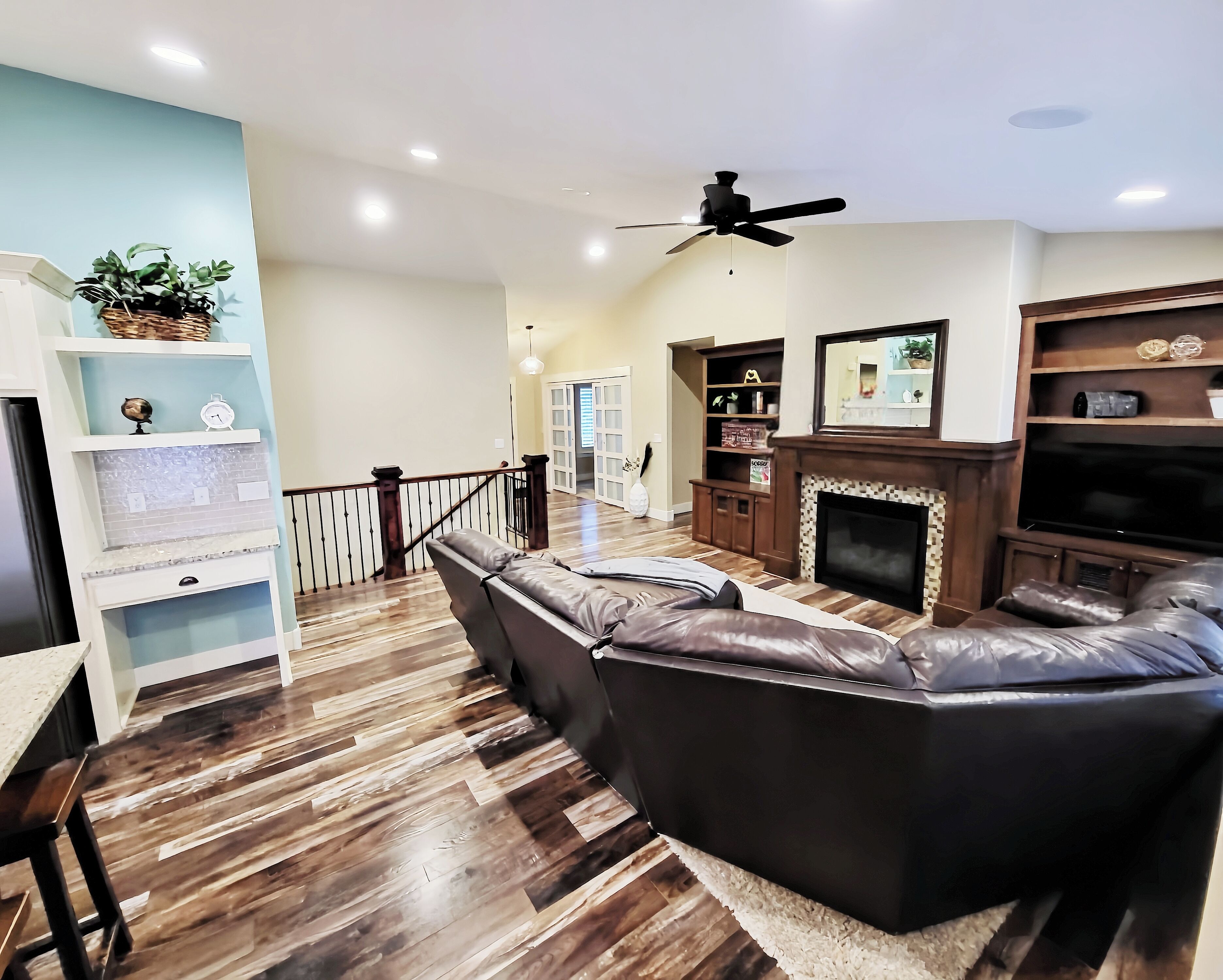 Smart TV, fireplace, books