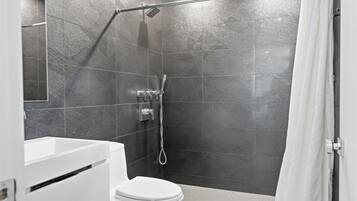 Shower, hair dryer, towels