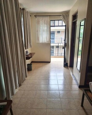 Habitación doble Deluxe, vista al jardín | Wifi gratis y ropa de cama 