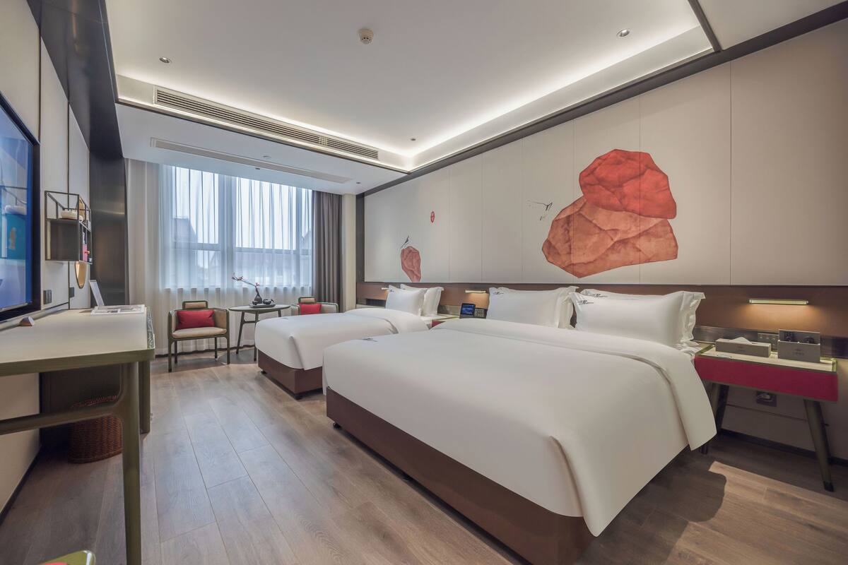 Habitación familiar con 2 camas individuales, vista a la ciudad | Wifi gratis