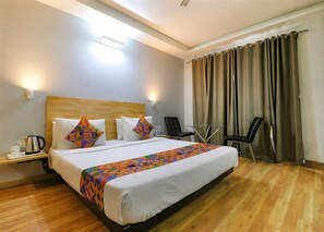 Deluxe Room | Desk, laptop workspace, blackout drapes, free WiFi - First By JPM (New Delhi)