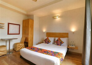 Deluxe Room | Desk, laptop workspace, blackout drapes, free WiFi - First By JPM (New Delhi)