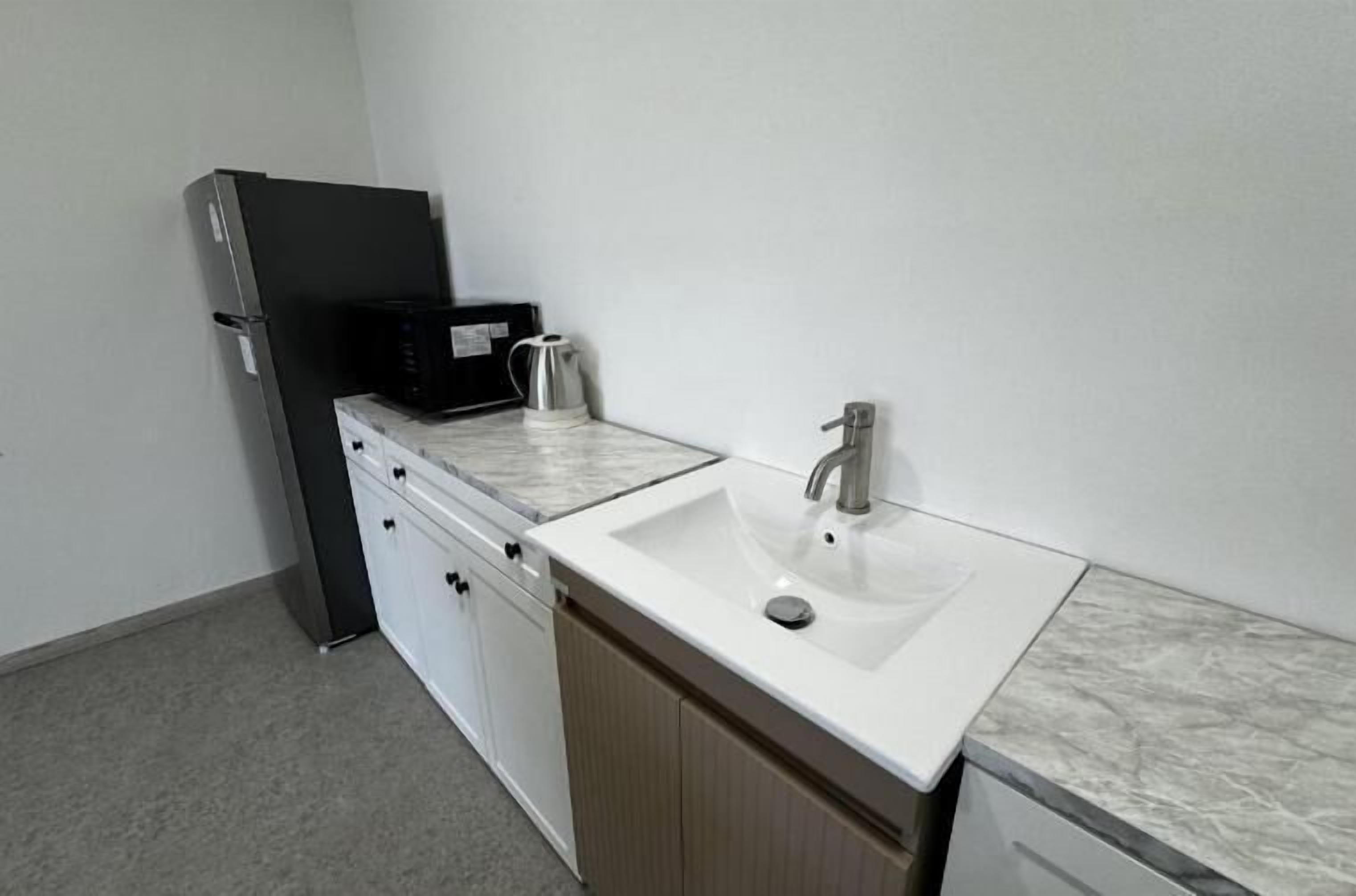 Junior Suite, Balcony, River View | Private kitchen | Fridge, microwave