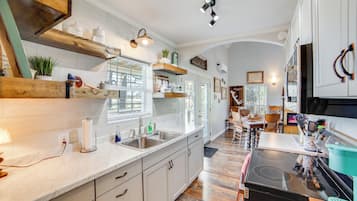 Fridge, microwave, stovetop, coffee/tea maker