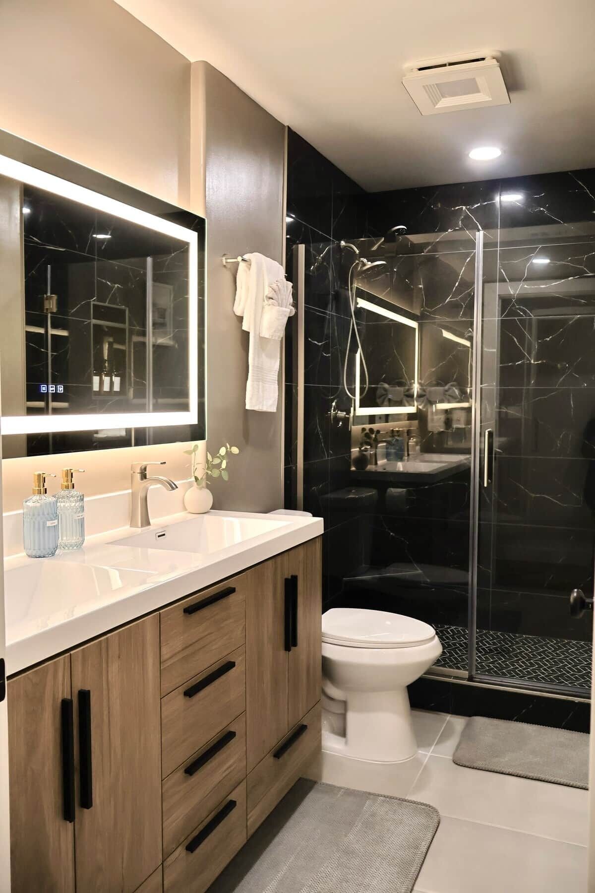 Shower, hair dryer, soap, toilet paper