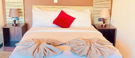 Deluxe Double Room, City View | Television