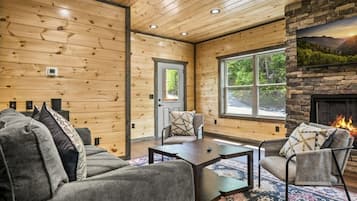 Cabane Signature, 2 chambres, bain à remous, cÎté montagne | Salle de séjour