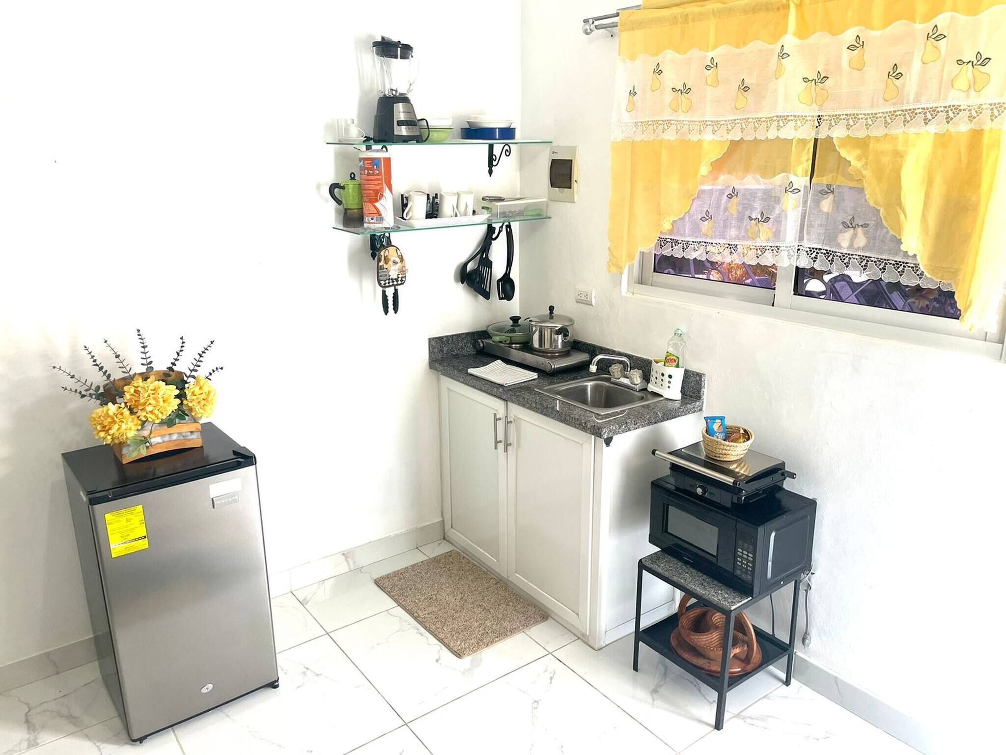 Fridge, microwave, coffee/tea maker, toaster
